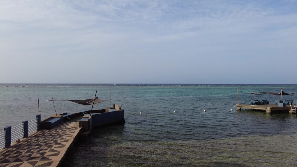 Private beach with clear water at Moxon’s Beach Club in St. Mary, Jamaica.