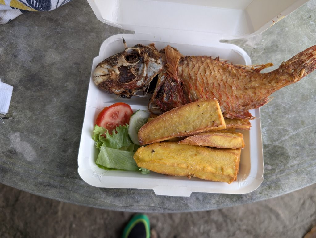 Plate of fried fish and sweet potato wedges served at Sugar Pot Beach in St. Mary, Jamaica.
