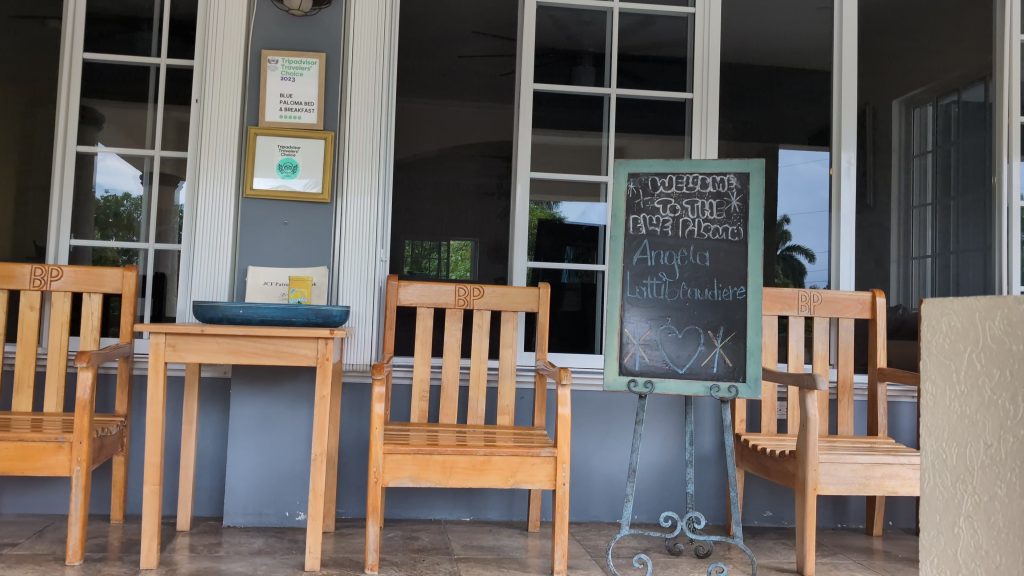 Veranda at Blue Paloma Bed and Breakfast in Lucea Hanover with luxury seating and tropical views