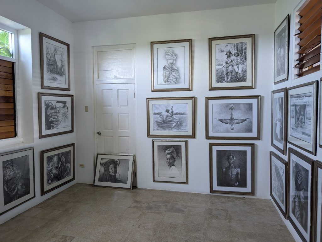 “Paintings displayed inside Jamaica Giants indoor gallery”