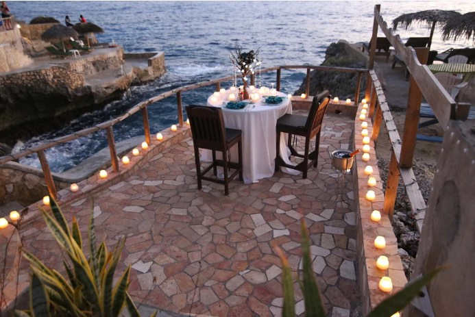 “Candlelight dinner setup at Westender Inn, Negril, Jamaica”