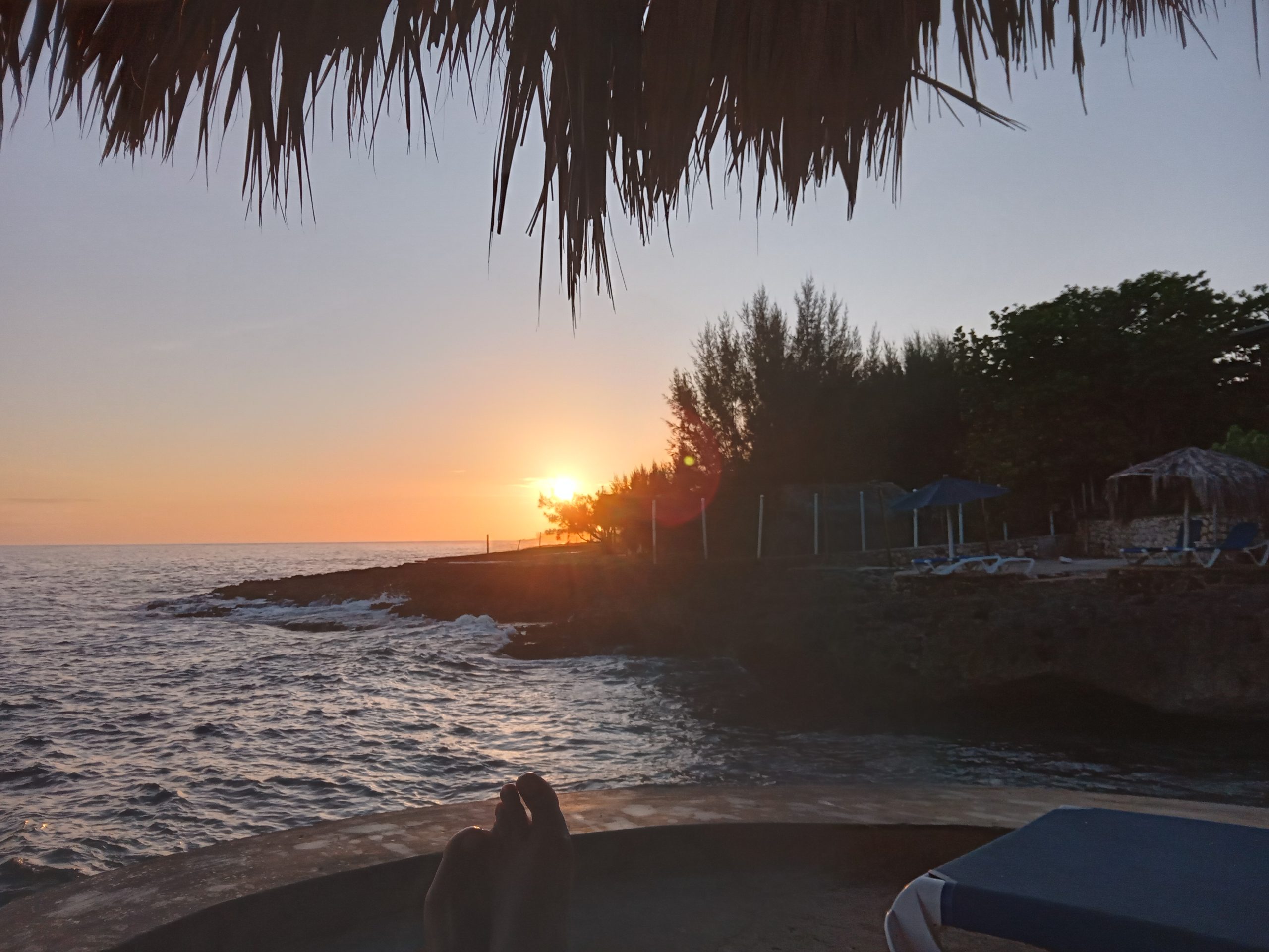 “Aerial view of Westender Inn Negril with Caribbean Sea in the background”