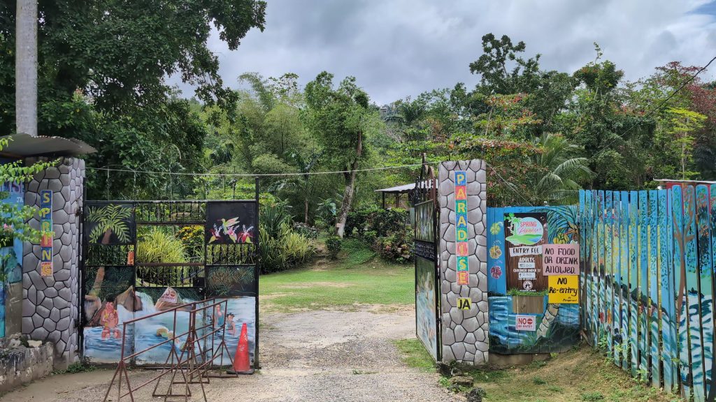 Entrance gate to Spring Paradise river attraction in Lodge St Ann Jamaica